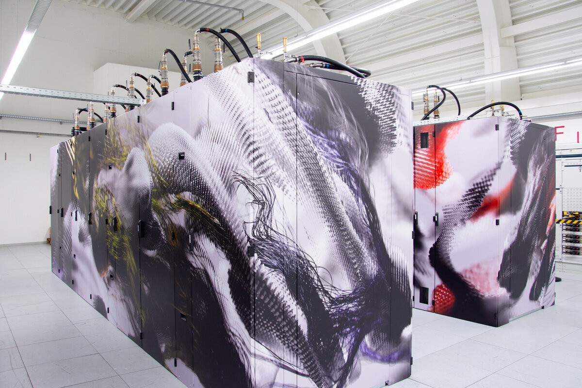 Black server cabinets in large hall